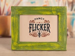 a picture frame with the word flickr painted on it